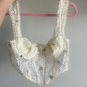 Cropped corset top. Only worn twice. Last picture is what it looks like on!